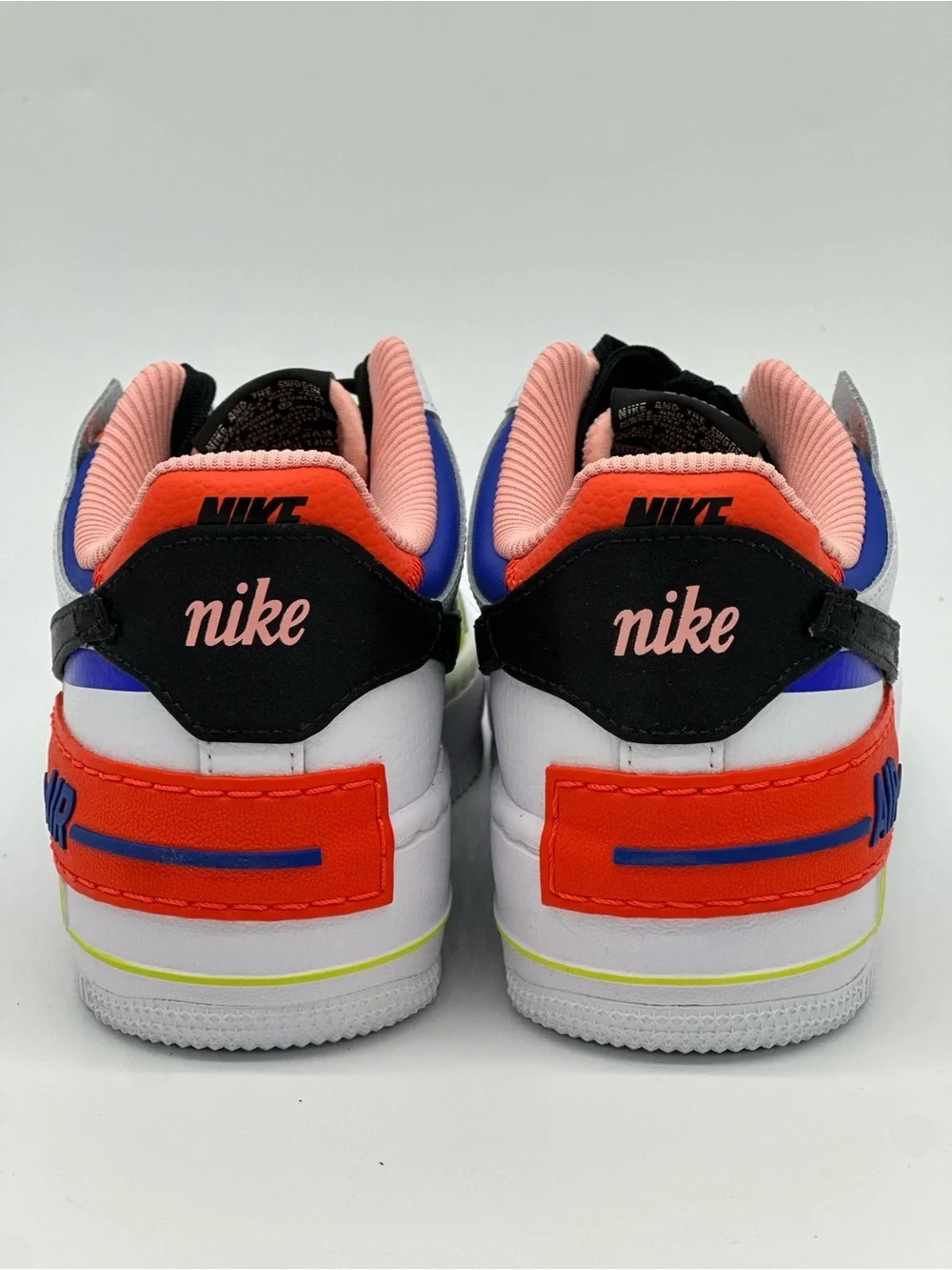 Nike Women's White Sneakers with Black, Neon Green & Pink Accents